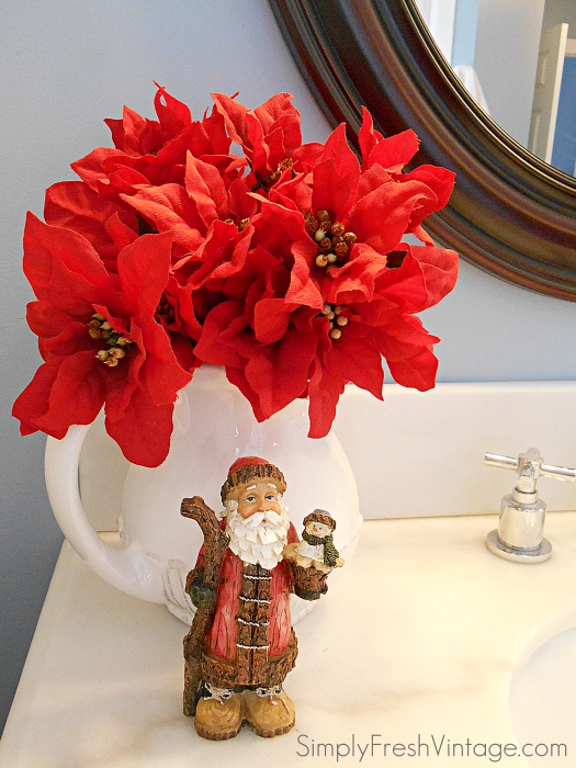Christmas is the perfect time to bring some Joy, Peace, Hope & Love in your home. I especially love adding holiday touches to our master bedroom and bathroom.  It's like visiting a bed and breakfast during the holidays! | SimplyFreshVintage.com